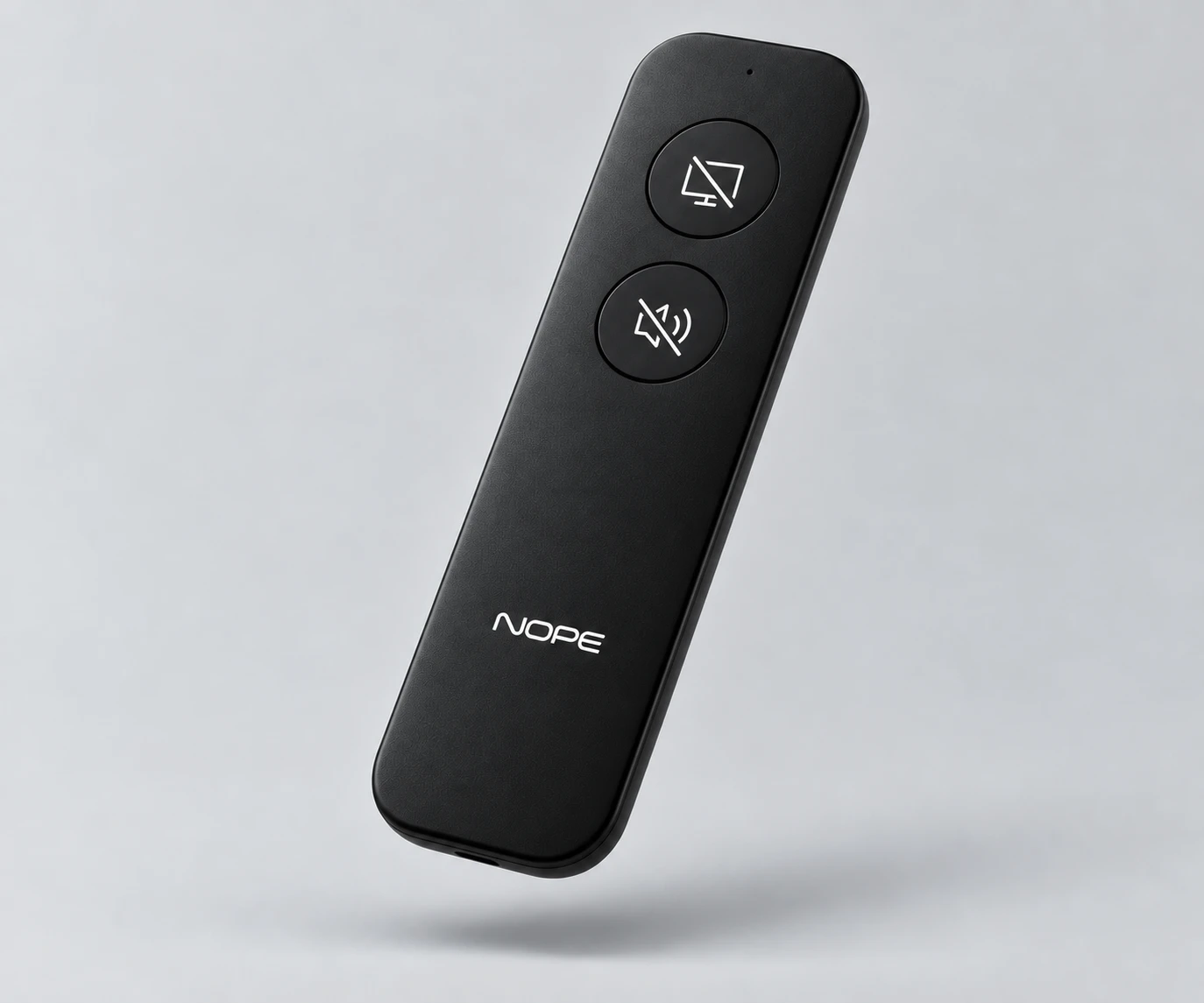 The NOPE remote: slim, matte black, with a screen-off button and a mute button